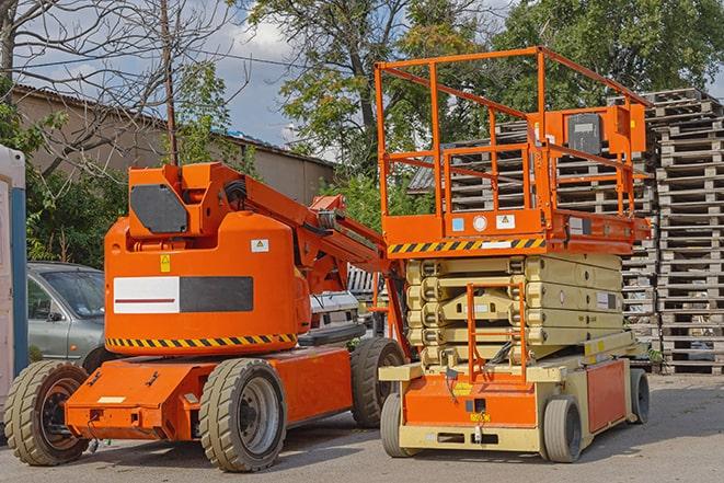 forklift loading pallets in a warehouse environment in Blasdell